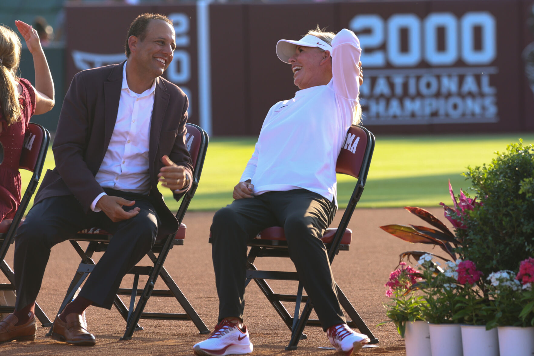 Joseph Harroz and Patty Gasso laugh
